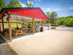 Covered pavilion and picnic tables at Indian Point Campground - thumbnail