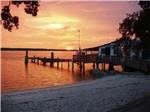 View larger image of Boat Dock with sunset view at NORTH BEACH CAMP RESORT image #5