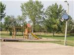 View larger image of Playground with swing set at SLEEPY HOLLOW CAMPGROUND image #2