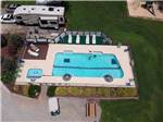 An aerial view of an RV shaped pool at LEISURE ACRES CAMPGROUND - thumbnail