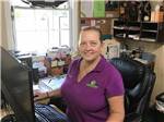 A woman working at the front desk at LEISURE ACRES CAMPGROUND - thumbnail