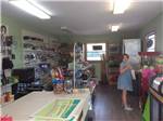 A person shopping in the general store at LUNDEEN'S LANDING - thumbnail