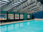 View larger image of Indoor pool with sunroof at OLD BARN RESORT image #8