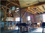 View larger image of Rustic dining room and bar at OLD BARN RESORT image #9