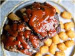 View larger image of Delicious ribs and tater tots at OLD BARN RESORT image #10