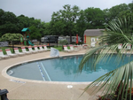 Chairs by the pool Treetops RV Community - thumbnail