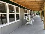 View larger image of Patio area with picnic tables at WOLFIES CAMPGROUND image #3
