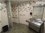 View larger image of The clean bathroom area at TRADERS VILLAGE RV PARK image #10