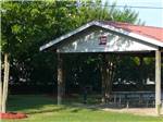View larger image of The pavilion with picnic benches at BARNYARD RV PARK image #5