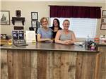 Staff standing behind the desk at COWBOY RV PARK - thumbnail