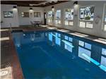 Interior pool area with large windows at Blue Ox RV Park - thumbnail