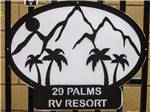 Business sign near entrance at TWENTYNINE PALMS RESORT RV PARK AND COTTAGES - thumbnail
