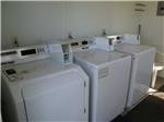 Washers and dryer in the laundry room at NIAGARA FALLS CAMPGROUND & LODGING - thumbnail