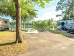 Open RV space with lake view at Flamingo Lake Sun RV Communities - thumbnail