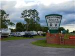 Welcome sign with park info at KELLY'S COUNTRYSIDE RV PARK - thumbnail