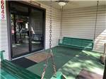 Porch swings at entrance at KELLY'S COUNTRYSIDE RV PARK - thumbnail