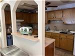 Kitchen with motorhome model on counter at KELLY'S COUNTRYSIDE RV PARK - thumbnail