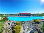 View larger image of View of pool and pool house at OCEAN SURF RV PARK image #1