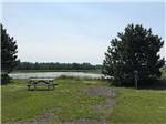 View larger image of Picnic table overlooking the water at OCEAN SURF RV PARK image #5