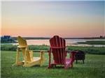 View larger image of Two chairs around a fire pit at OCEAN SURF RV PARK image #9