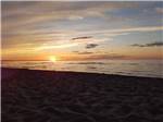 View larger image of Sun setting over the ocean at OCEAN SURF RV PARK image #12