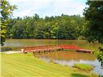 The red dock on the lake at SOARING EAGLE CAMPGROUND & RV PARK - thumbnail