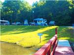 Standing on the red dock looking at the RV sites at SOARING EAGLE CAMPGROUND & RV PARK - thumbnail
