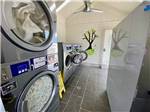 View larger image of Interior view of laundry room at ALMOND TREE OASIS RV PARK image #4