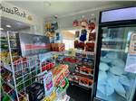 Cooler with bags of ice at general store at ALMOND TREE OASIS RV PARK - thumbnail