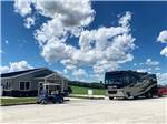 View larger image of RV parked near main office at AMANA RV PARK  EVENT CENTER image #7