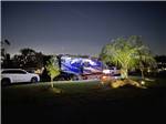 View larger image of A trailer in an RV site at night at OCALA NORTH RV RESORT image #7