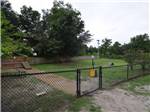 View larger image of The fenced in pet area at OCALA SUN RV RESORT image #3