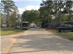 View larger image of RVs and trailers at campground at SUGAR MILL RV PARK image #9