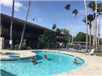 Guest enjoying the swimming pool at RIVER BEND RESORT & GOLF CLUB - thumbnail