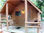One of the rental log cabins at FLAT CREEK FAMILY CAMPGROUND - thumbnail