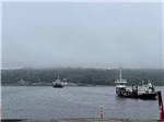 A couple of car ferries going across the lake at HARDINGS POINT CAMPGROUND - thumbnail