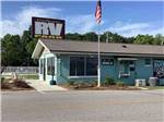 The office building with a flag at DOTHAN RV PARK - thumbnail