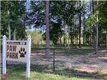 Sign in the fenced dog area at DOTHAN RV PARK - thumbnail
