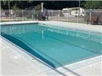 The fenced in swimming pool at DOTHAN RV PARK - thumbnail