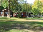 A row of rustic rental cabins at LAKE BLUFF CAMPGROUND - thumbnail