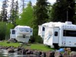 5th wheels parked along the water at Sheridan Lake Resort - thumbnail