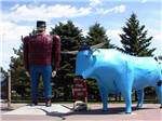 Large statues of Paul Bunyan and Babe the Blue Ox at ROYAL OAKS RV PARK - thumbnail