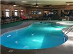 Indoor pool area with seating at Lifestyle RV Resort - thumbnail