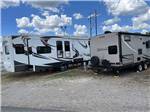 A group of gravel RV sites at OVERLAND RV PARK - thumbnail