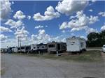 A row of full RV sites at OVERLAND RV PARK - thumbnail