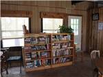 A lot of books to enjoy in the FCS day room at FORT CLARK SPRINGS RV PARK - thumbnail