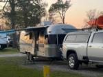 An airstream parked at a site at THE OUACHITA RV PARK - thumbnail