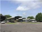 A line of covered RV sites at MOCKINGBIRD HILL RV PARK - thumbnail