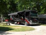 RV parked with panic area at site Hickory Haven Campground - thumbnail