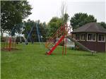 View larger image of Playground with swing set at INTERSTATE RV PARK image #7